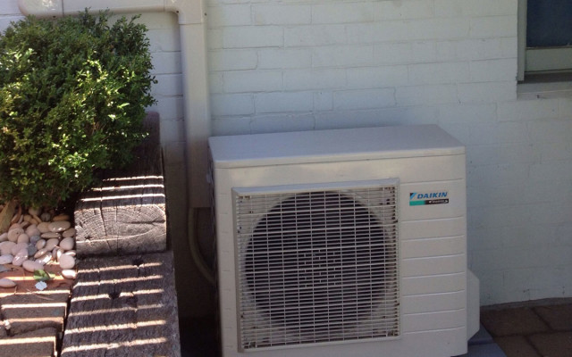 Split system air conditioner installation and servicing